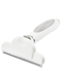 Grande brosse anti-perte blanche pour chien, dents métalliques fines et poignée ergonomique, réduit la perte de poils.